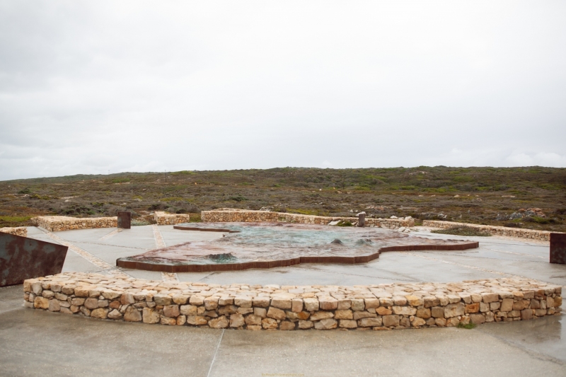 The Southernmost Point monument is a large cement and metal powder continent-shaped work of art